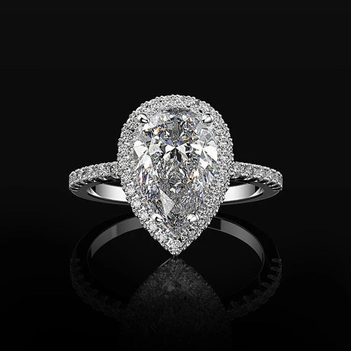 Pear-Shaped Halo Ring In Clear, Pink, Gold, And Silver Variants