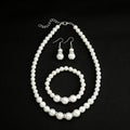 White Pearl Look Necklace Bracelet and Earring Jewelry Set view 4