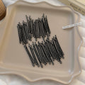 Black Wavy Bobby Hair Pins In A Fifty Piece Set For Styling view 6