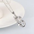 Pink Blossom and Butterfly Pendant Necklace with Polished Metal Finish view 4