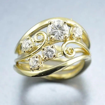 Gold multi band swirl clear CZ finger ring close-up studio