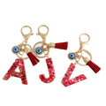 Red Resin Shell Letter Keychain with Evil Eye and Tassel view 4