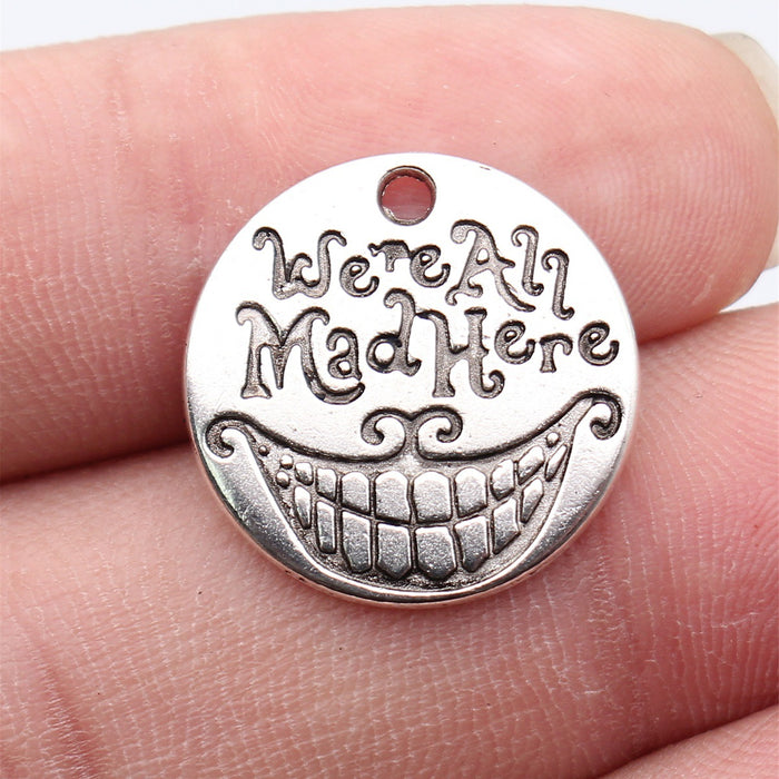 We Are All Mad Here Grinning Face Round Metal Pendant