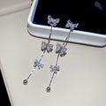 Bow Crystal Chain Drop Stud Earrings in Gold and Silver view 7