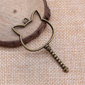 Cat Head Open Frame Charm In Antique Bronze For Jewelry Making view 2