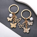 Rhinestone Openwork Butterfly and Faux Pearl Charm Keychain view 2