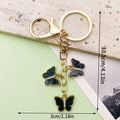 Butterfly Charm Keychains Featuring Blue Butterfly Across 35 Pictured Variations view 11