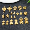 Gold-Tone Bear and Elephant Metal Charms with 10 Listed Options view 1