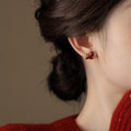 Red Enamel Horse Stud Earrings with Gold Tone Details view 4