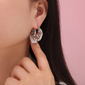 Crinkled Disc Hoop Earrings in Gold and Silver Tone view 3