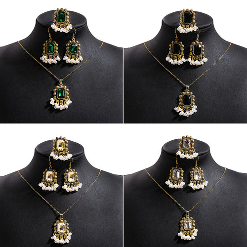 Four antique gold pearl jewelry set colorways on black busts grid layout