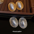 Ribbed Oval Frame Pearl Statement Stud Earrings in Gold and Silver view 1