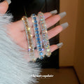 Silver Tone Hinged Crystal Bracelet In Multicolor Blue Or Champagne view 4