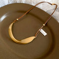Curved Metal Bib Cord Necklace with Distinctive Textured Details view 6