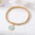 Gold Tone Bead Stretch Bracelets with Round Evil Eye Charms view 9