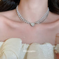 White Pearl and Crystal Heart Layered Necklace with Detailed Finish view 1