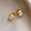 Gold Tone Brushed Oval Stud Earrings With Clear Crystal Centers view 3