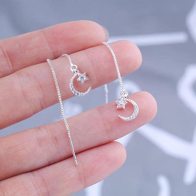 Product view showing long threader chains ending in crescent moon and star crystal motifs