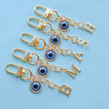 Gold-Tone Rhinestone Evil Eye Charm With Letter Cutout Pendant view 3