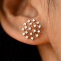 Rose Gold Tone Starburst Crystal Stud Earrings with Polished Finish view 2