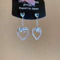 Blue Open Heart Drop Earrings With Silver Crystal Bow Tops view 1