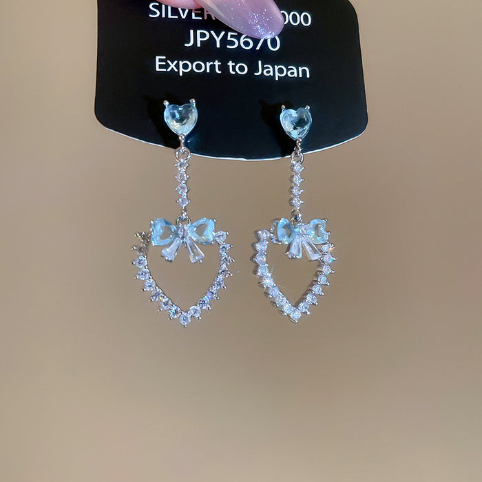 Blue Open Heart Drop Earrings With Silver Crystal Bow Tops