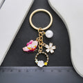 Pink Butterfly White Flower and Pearl-Look Wreath Keychain view 4