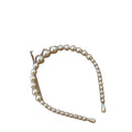 Six Hair Accessory Styles With Pearls Bows Flowers And Braids view 5