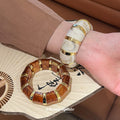 Cream Or Brown Marbled Segmented Stretch Bracelet With Gold Spacers view 1