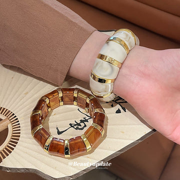 Cream Or Brown Marbled Segmented Stretch Bracelet With Gold Spacers