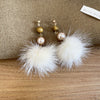 Brown Pom Poms