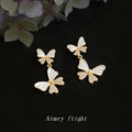 Gold Dual Butterfly Drop Earrings White Enamel Zircon view 1