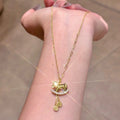 Gold Tone Rocking Horse Pendant Necklace with Chain Tassels view 4