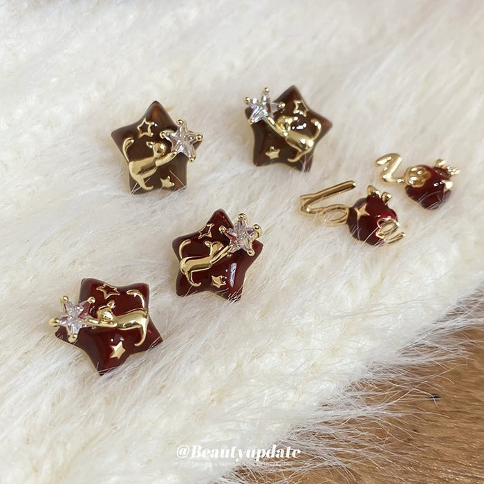 Gold Tone Star Stud Earrings with Red Brown Inlay Designs