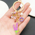 Four-Color Butterfly Pearl and Flower Bouquet Mother Keychain Collection view 2