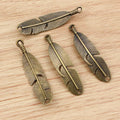 Long Feather Charms in Four Distressed Metal Finishes view 4