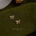 Mini Openwork Bow Stud Earrings In Gold And Silver Tone view 3