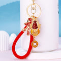 Gold Toad and Coin Keychains with Braided and Bare Wrist Loops view 6