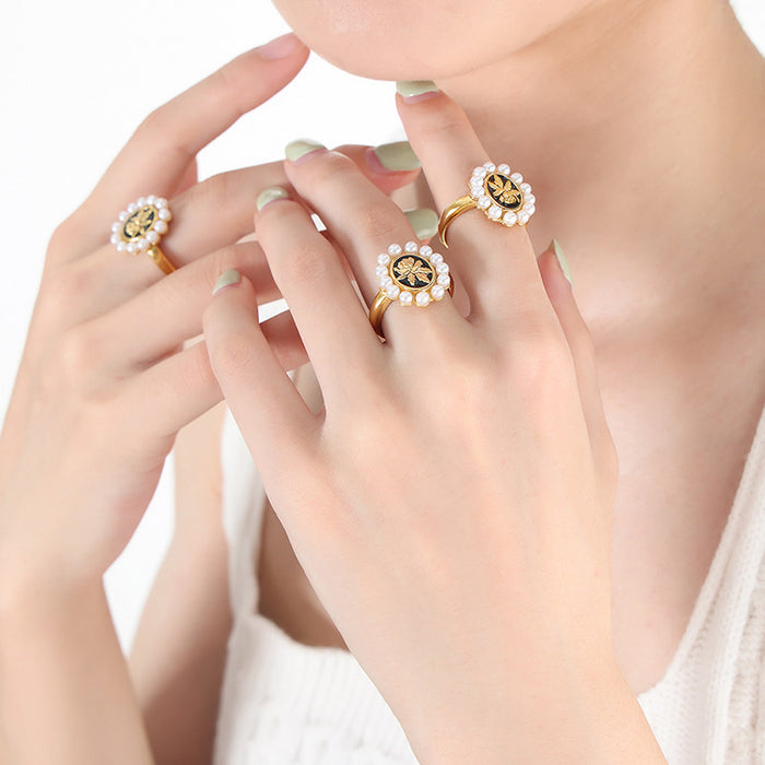 Pearl Halo Open Ring Black Enamel Gold Flower Motif