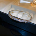 Raised Flower Crystal Hinged Bangle In Gold Tone Or Silver Tone view 6