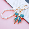 Full Crystal Bow Keychains with Plain Pearl Strand and Fortune Loop Options view 3