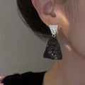 Black and Silver Mismatched Textured Triangle Earrings view 4