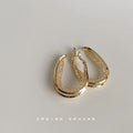 Gold Tone Elongated Oval Mesh Texture Hoop Earrings view 3
