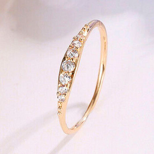 Product view 2 showing slender band with a curved row of clear stones