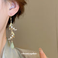 Gold Tone Leaf And Pale Green Teardrop Hook Earrings view 3
