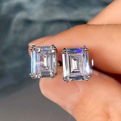 Second product view showing silver-tone rectangular step-cut clear solitaire stud earrings