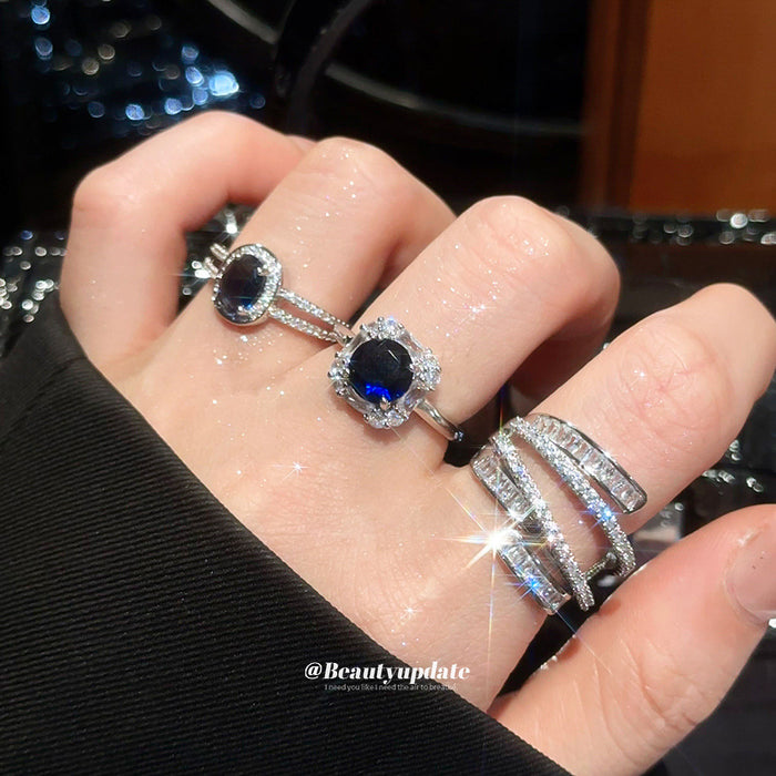 Silver Multi Row Crystal Open Ring Blue Oval Halo Band