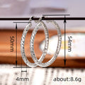 Faceted Twist Large Hoop Earrings Three Metal Colors view 4
