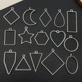 Black Star and Moon Metal Charms with 23 Listed Options view 1