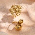 Sculptural Flower and Waterdrop Open Rings in Gold Tone view 4